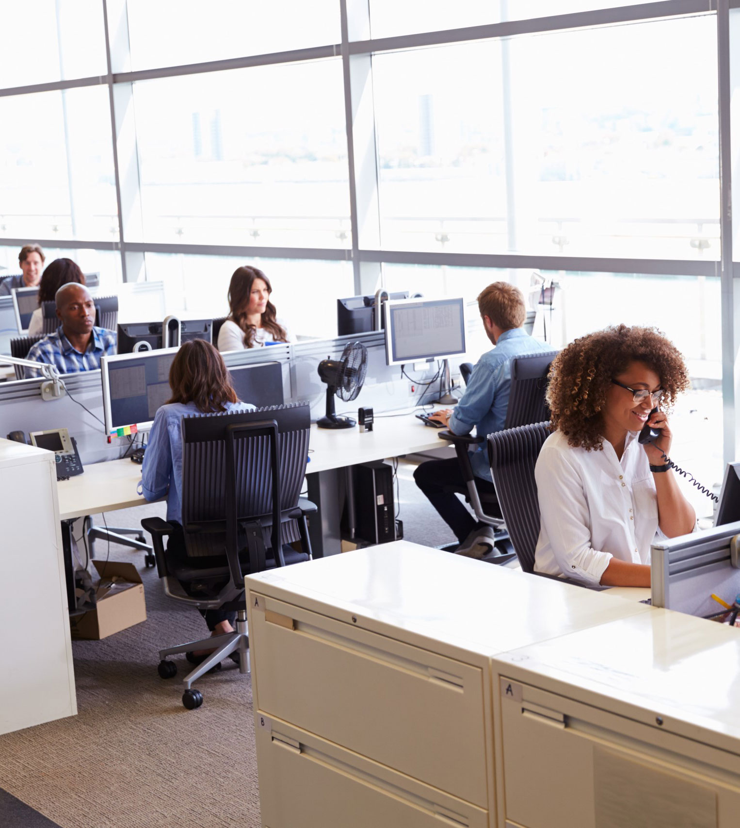 CINICO staff at work in an open-plan office